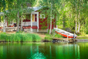 Red cottage on a lake